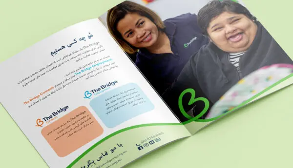 Open brochure mockup: Farsi text and The Bridge logos on left, photo of a support worker and smiling client on right.