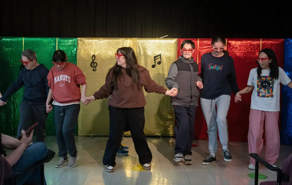 People dancing and signing in The Bridge drama club at Macleod Day Program